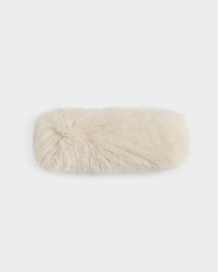 The Rudsak ARLETTE - 8425544 Vanilla is a fluffy, cream-colored rectangular faux fur muff—an ideal winter accessory—shown on a plain white background.