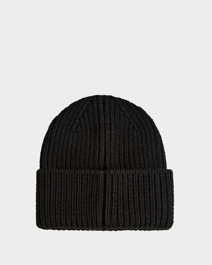The Rudsak CYBELLE - 9424504 Black/Silver unisex beanie features a ribbed knit design and folded cuff, shown on a plain light gray background.
