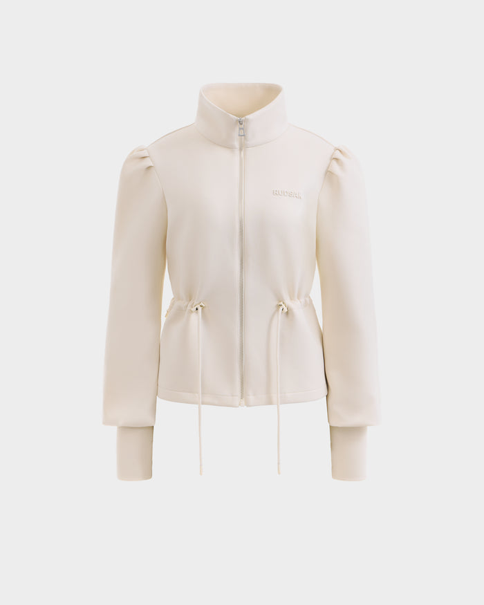 The Rudsak ELODIE - 8526039 Iceland is a cream zip-up sweater jacket with a high collar, puffed sleeves, ribbed cuffs, waist drawstrings, and subtle chest logo—crafted from stretch cotton blend for lightweight comfort.