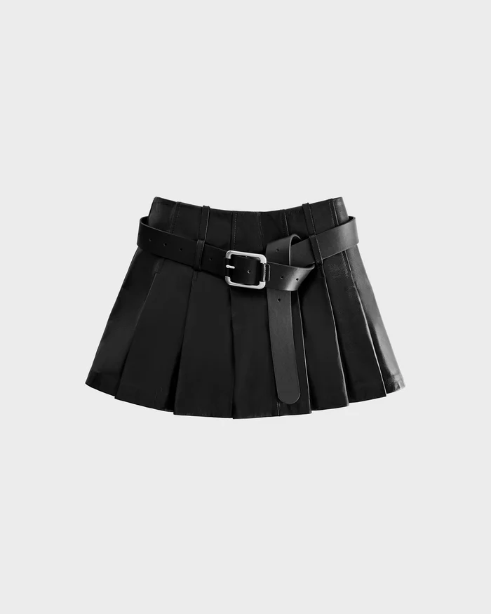 The Rudsak FELICITY - 8525650 Black is a high-waist mini skirt in pleated black leather, featuring a wide belt with a large silver buckle, shown on a plain light gray background.