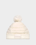 The Rudsak GALA - 8424514 Iceland womens white quilted down puffer hat features premium down insulation, a removable faux fur pom pom, and a folded brim with a Rudsak label, shown against a plain light gray background.