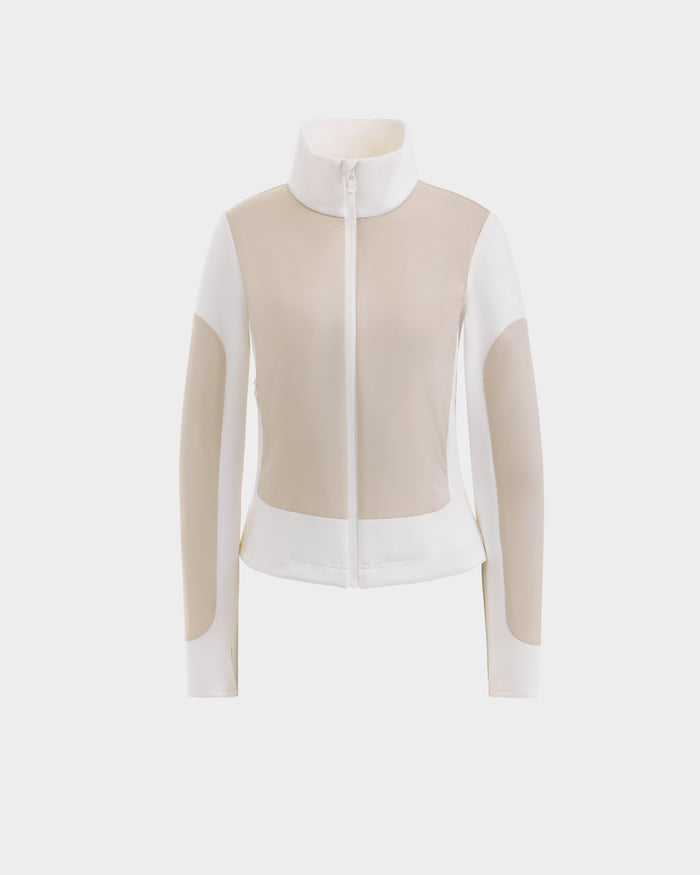The GRANADA - 8126023 Vanilla by Rudsak is a beige and white zip-up jacket with a high collar, long sleeves, fitted design, and color-blocked panels—perfect for sporty-chic everyday comfort and style.