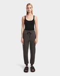 A woman stands facing forward, wearing Rudsaks JOSS - 9524009 Grey W joggers against a plain white background.