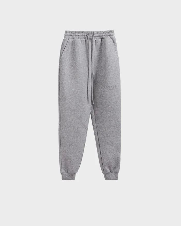 Rudsak JOSS - 9524009 Heather Grey M unisex jogger sweatpants feature an elastic waistband, drawstring, side pockets, and cuffed ankles in premium cotton, shown against a plain white background.