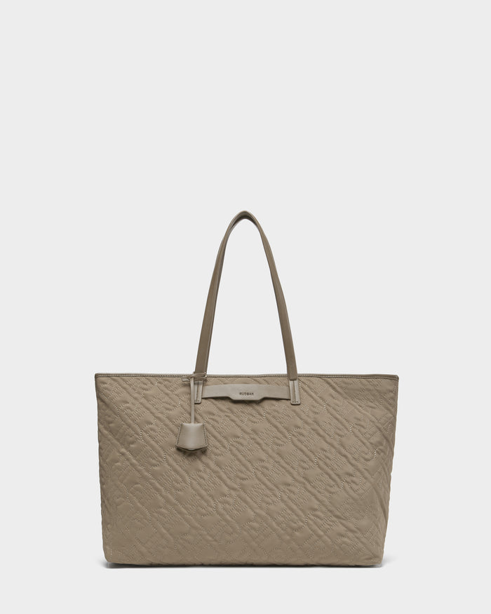 The Rudsak LIVORNO - L325007 Almond bag is a luxury tan carryall with a handle, effortlessly blending style and function.
