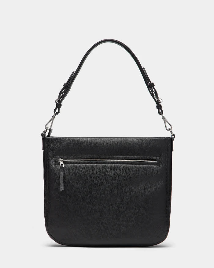 The Rudsak LUCYLE - 8325012 Black women’s leather hobo bag in medium size features a single adjustable shoulder strap and a silver front zipper pocket, shown against a plain white background.