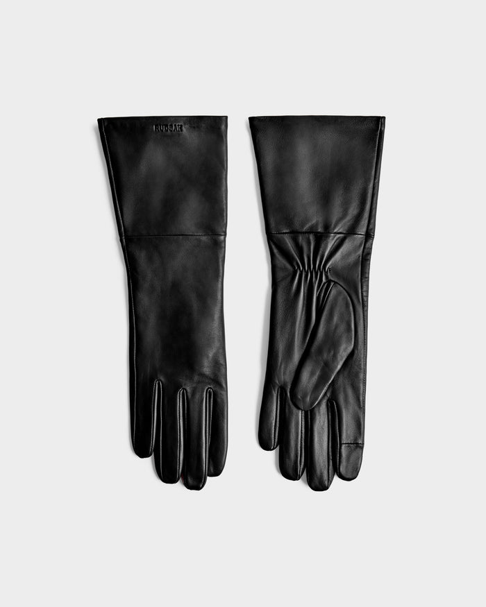 The MEGAN - 8425541 Black leather gloves by Rudsak, a stylish women's accessory, are shown on a plain light gray background with one glove displaying the palm side and the other the back.