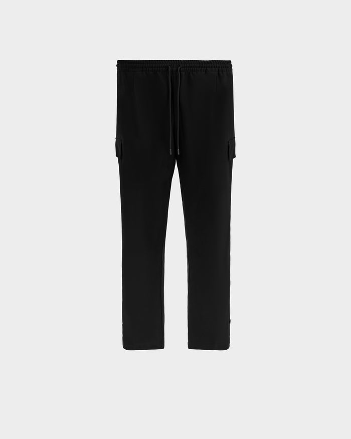 The Rudsak MIKEY - 6525597 Black men’s trousers feature a modern tailored fit, straight legs, elastic drawstring waistband, and side pockets, shown against a plain light gray background.