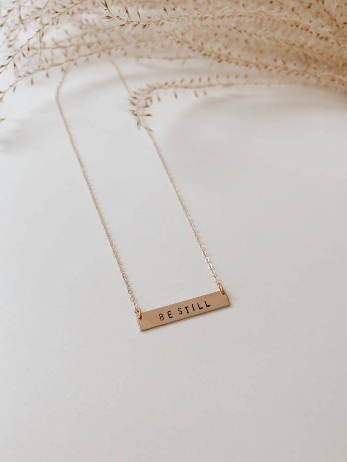 Océanne - 'Be Still' Stamped Bar Necklace: Gold-filled / Arial (default) / Horizontal