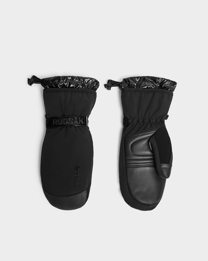 A pair of Rudsak OLTEN - 9425565 Black ski mittens with adjustable wrist straps, 3M Thinsulate insulation, textured back, smooth leather-like palm, and shiny elastic cuffs is displayed on a plain white background.