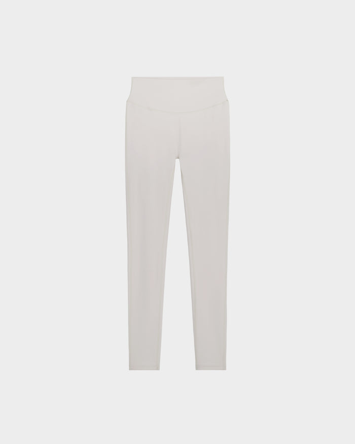 The Rudsak SONOMA - 8525071 Vanilla high-waisted leggings feature a full-length, solid off-white design made from technical fabric, with no visible logos or patterns. Shown against a plain white background.