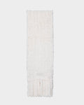 The TAVIA - 8426511 Vanilla scarf by Rudsak is a long, white, fluffy knit accessory with tasseled ends, neatly folded against a plain light background.