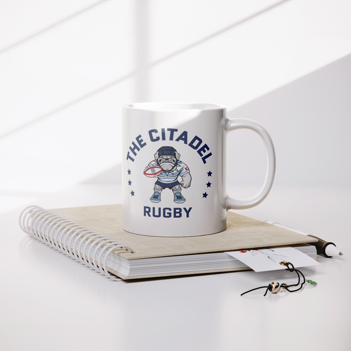 The_Citadel_Womens_Rugby_Mug_-_11oz_Lifestyle_Notebook_Mockup.png
