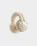 A pair of Rudsak VALENCIA - 8425543 Vanilla earmuffs, cream-colored and fluffy with a soft texture and a large R detail, photographed on a light gray background—an essential winter accessory.