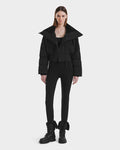 A woman in the Rudsak YVETTE - L125557 Black, a stylish women’s cropped down jacket with an oversized collar, made from RDS-certified down.