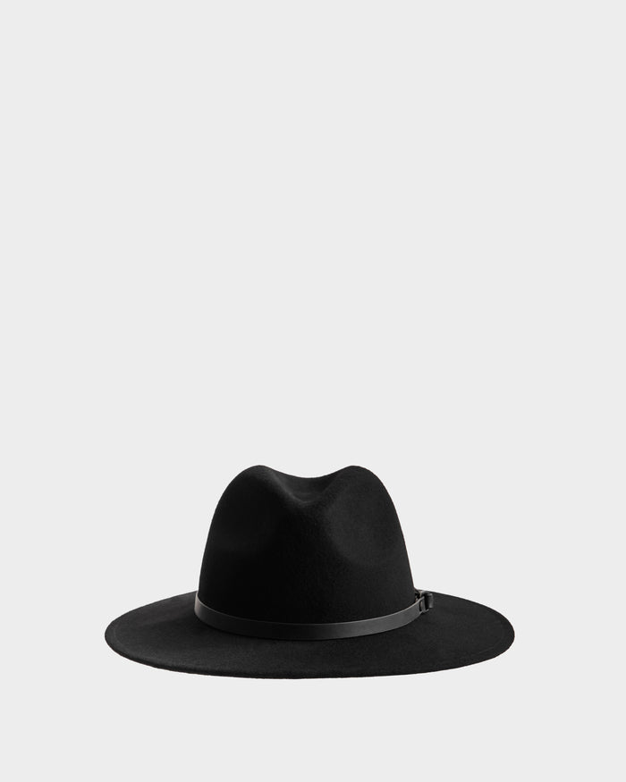 The Rudsak ZELDA - 8425536 Black is a women’s wool fedora made from premium felted wool with a wide brim and thin black band, shown against a plain light gray background.