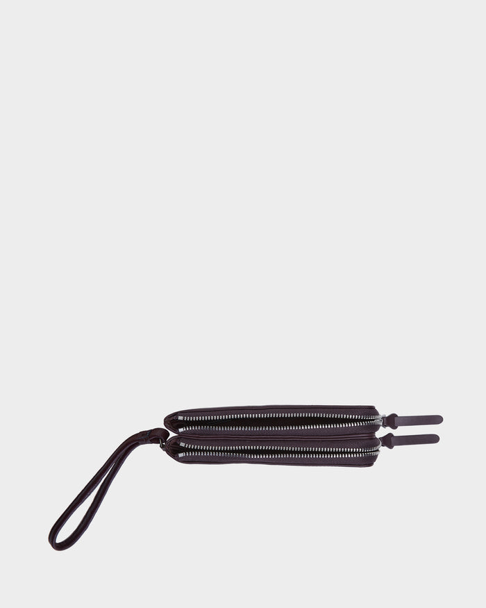 The ZURIE - L424501 Wine by Rudsak is a women's leather wristlet wallet in black, with two silver zippered compartments and a looped strap, displayed flat on a plain white background.